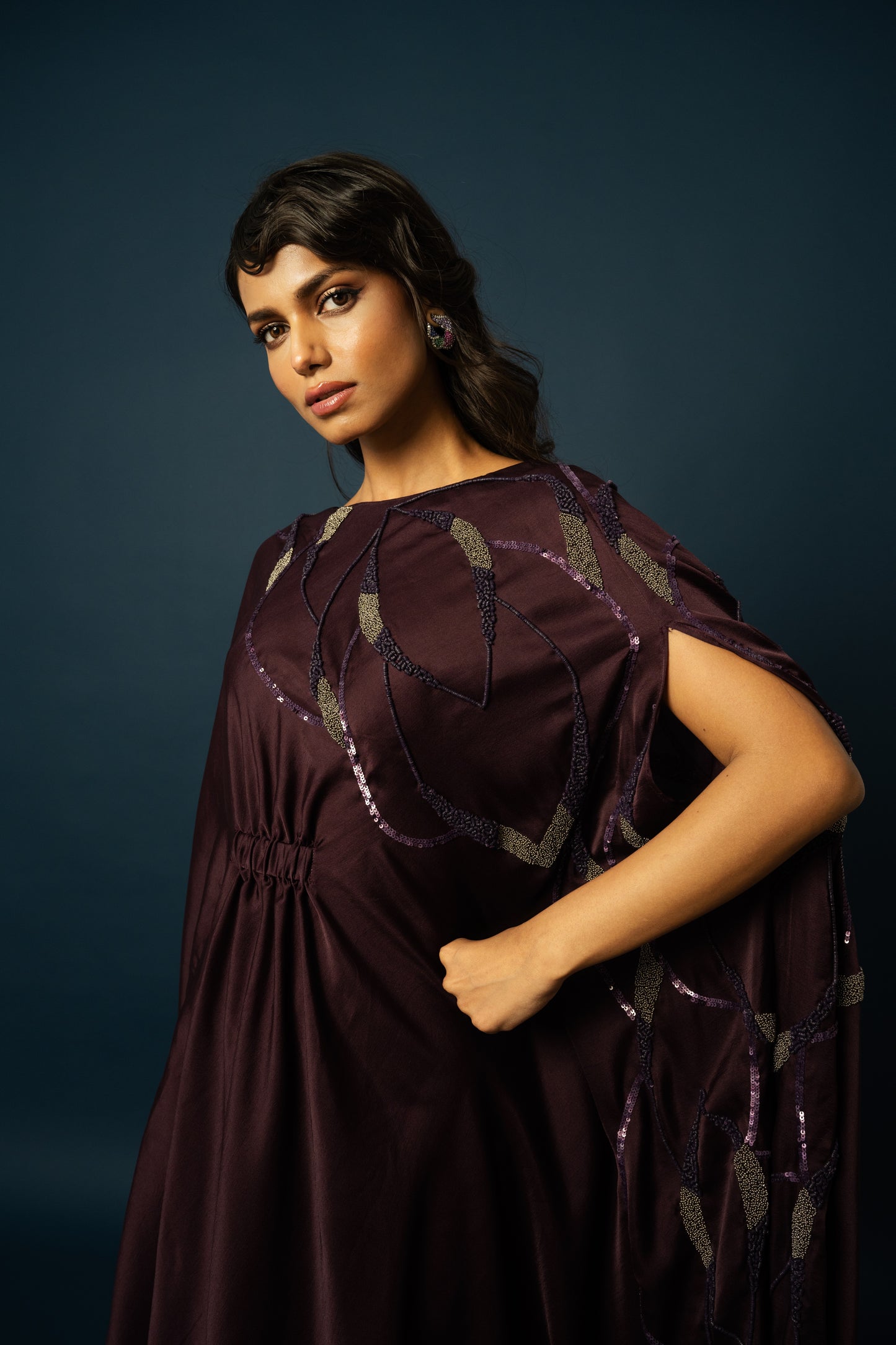 Stylish Gown with side ornamentation